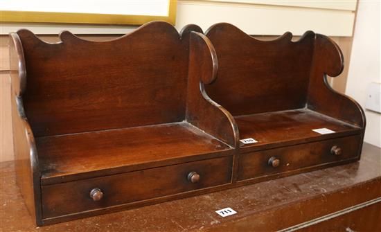 A George III mahogany book rack, with two base drawers W.74cm